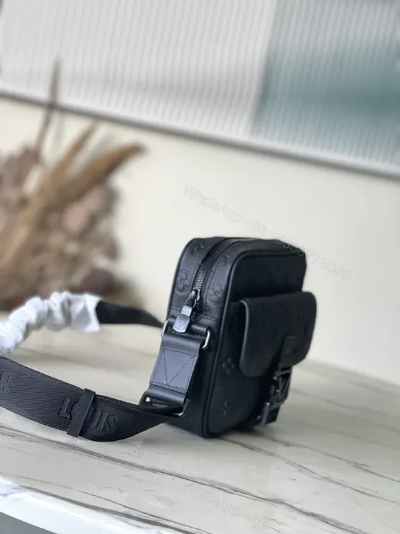 View 8 of Black Monogram Leather Messenger: Compact, Weather-Ready Luxury