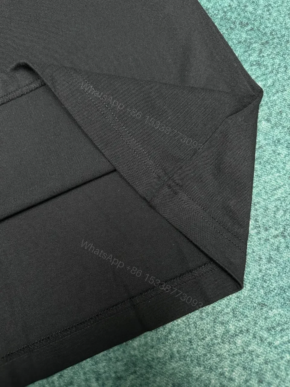 View 2 of Minimalist Black Tee: Crest-Inspired, Elevated Comfort Tee