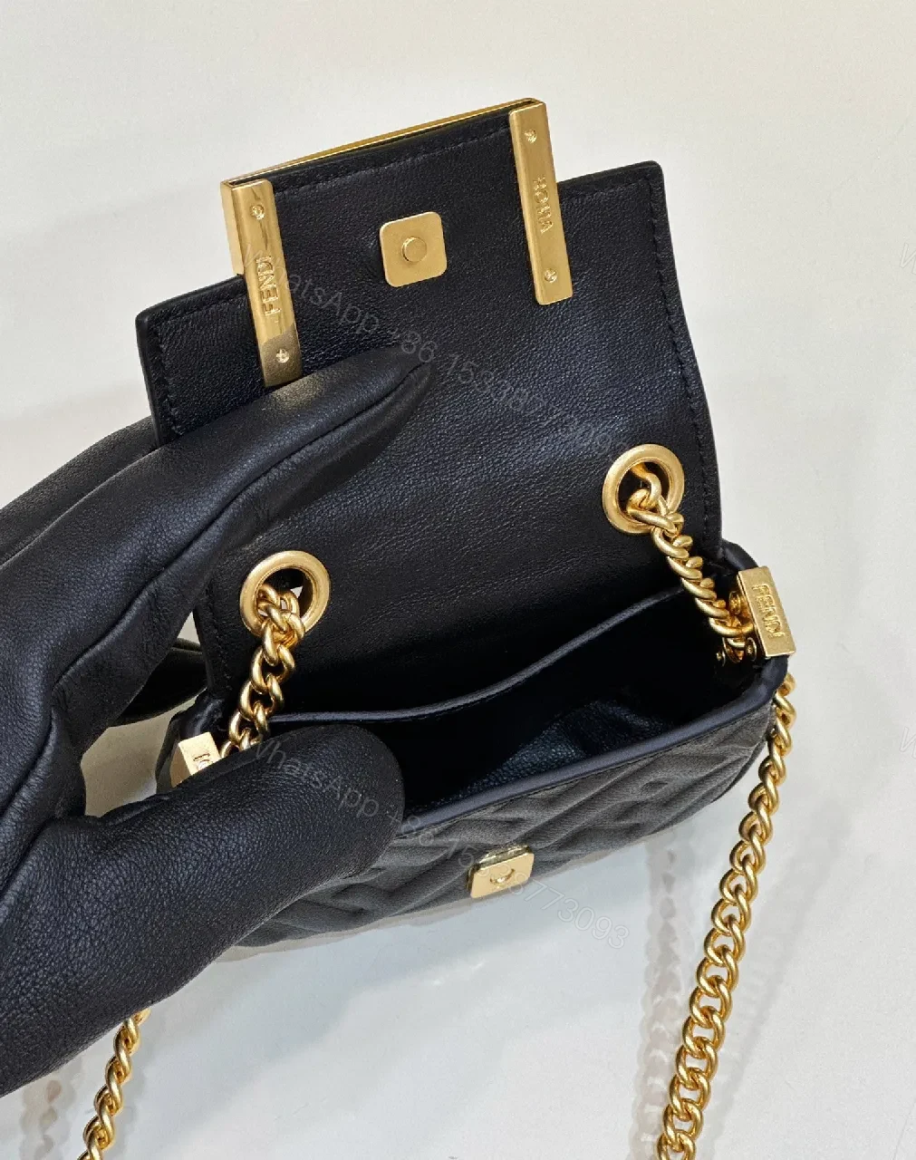 View 5 of Compact Leather Crossbody: Textured Luxury with Gold Chain Strap