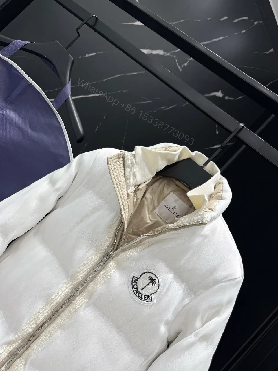 View 5 of White Puffer Jacket with Iconic Emblem, Luxury Everyday Outerwear