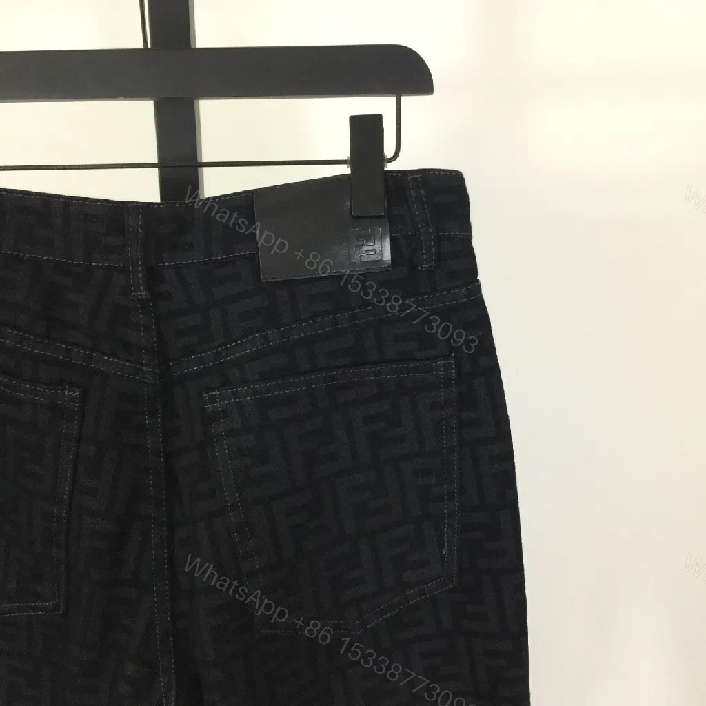 View 8 of Monogram Denim Trousers - Structured Texture, Modern Versatility