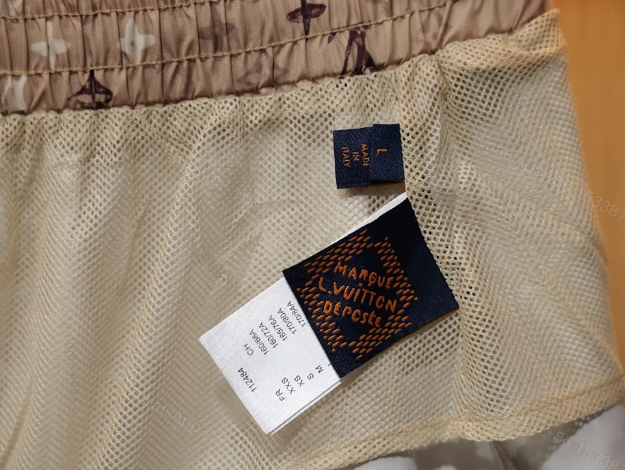 View 8 of Beige Monogram Print Drawstring Swim Shorts