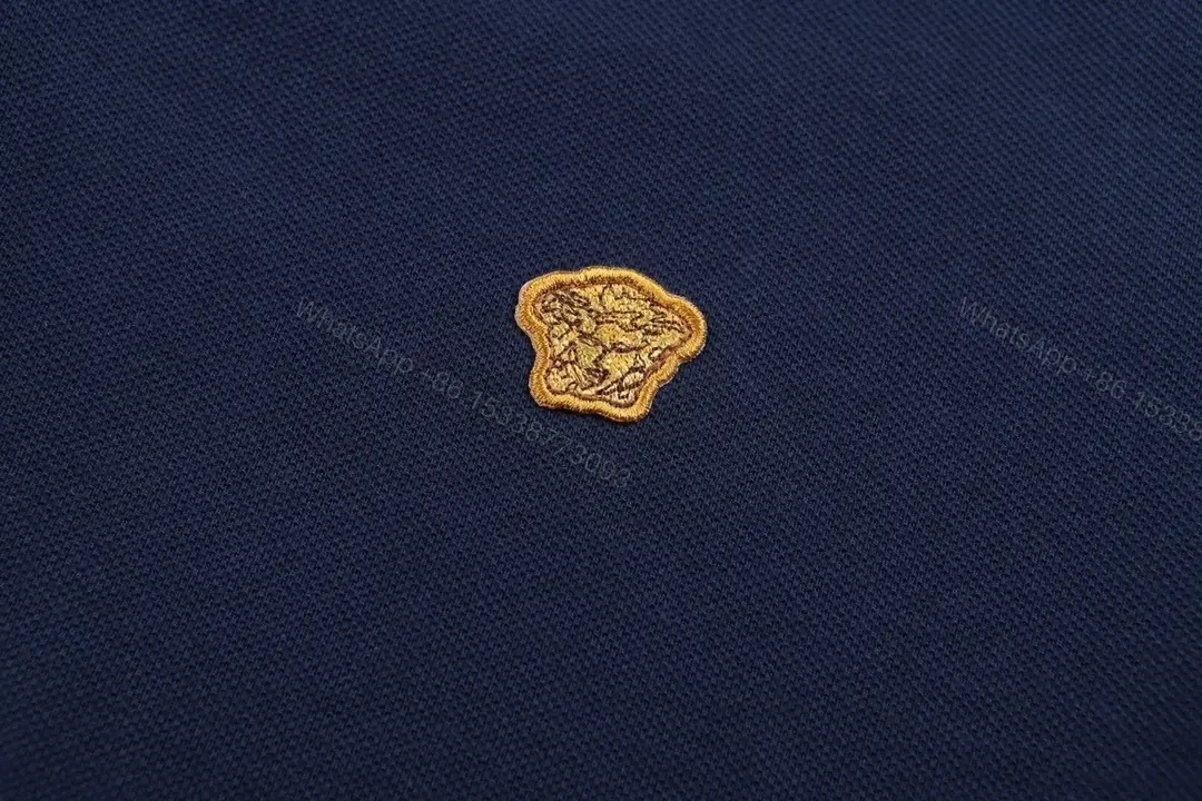 View 8 of Minimalist Navy Knit Polo: Subtle Crest Luxury Polo