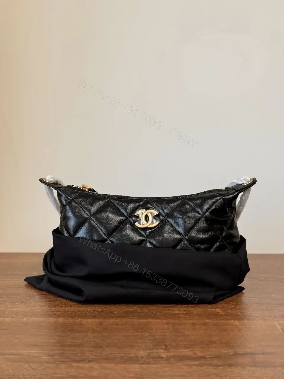 View 9 of Quilted Crossbody with Gold Emblem: Compact Luxury Bag