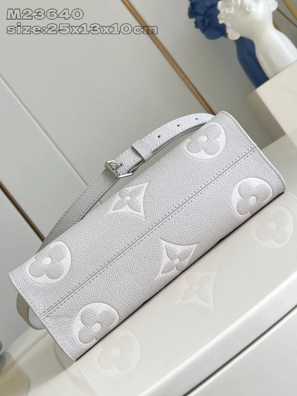 View 3 of Monogram Embossed Leather Tote: Structured Luxury Bag