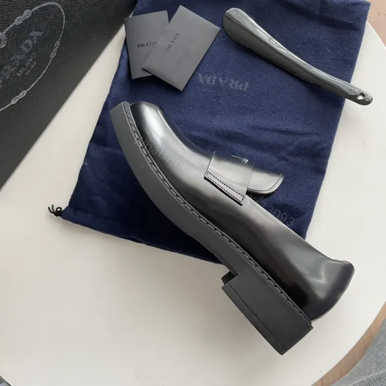 View 9 of Glossy Prada Penny Loafer: All-Day Confidence in Patent Leather