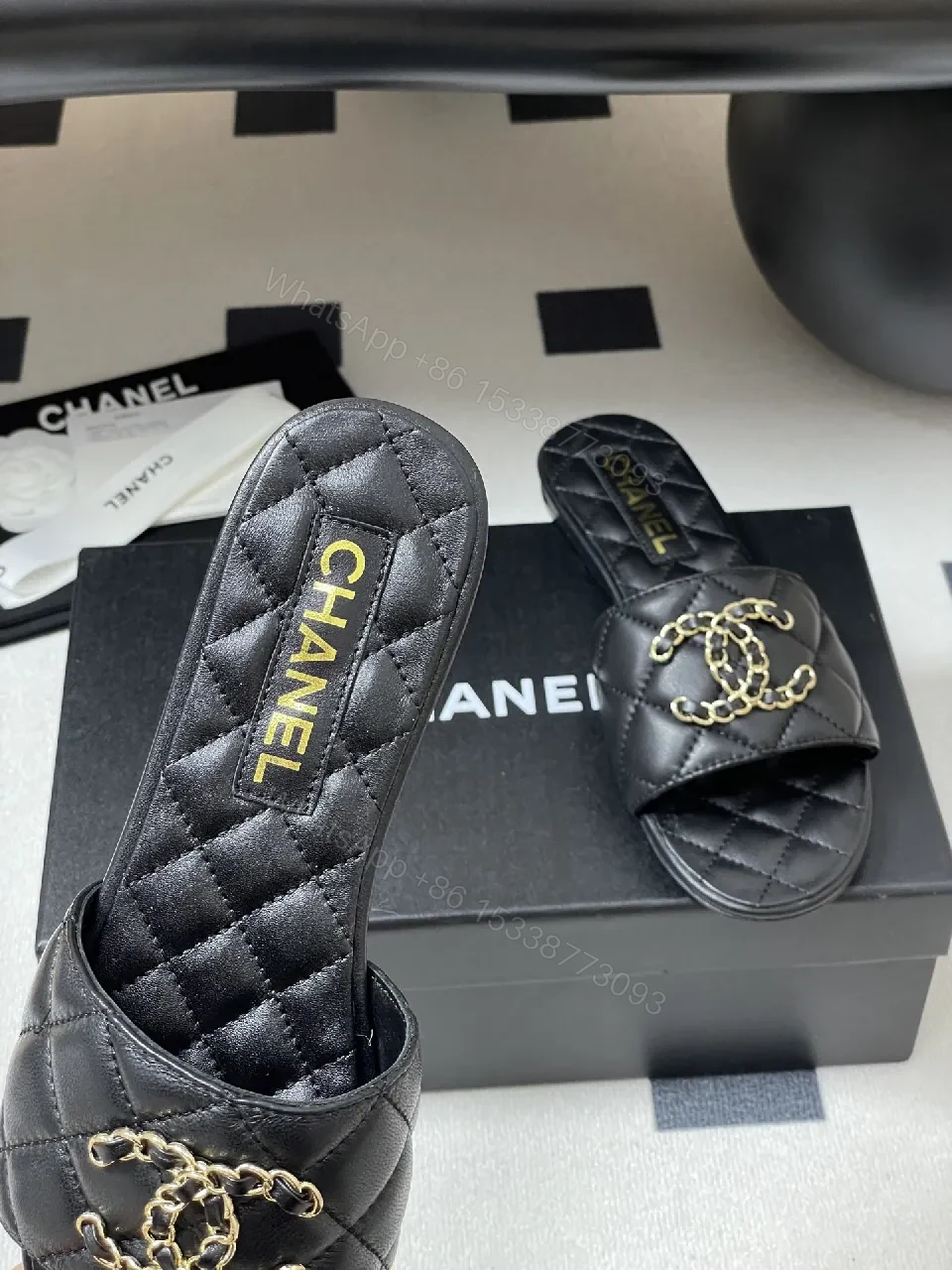 View 2 of Quilted Leather Slides with Gold Chain Detail Luxury