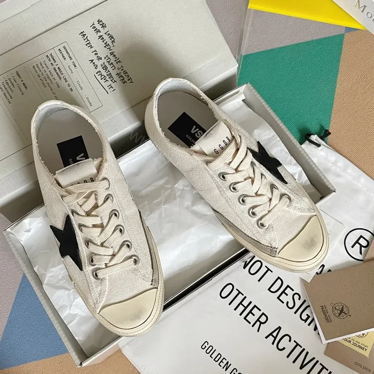 View 6 of Chic Canvas Star Sneakers - Signature Detail, Unisex