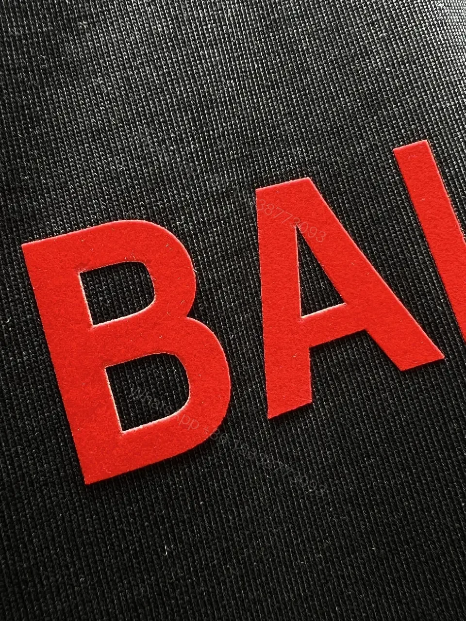 View 8 of Black Cotton Crewneck Tee with Subtle Red Logo Embroidery