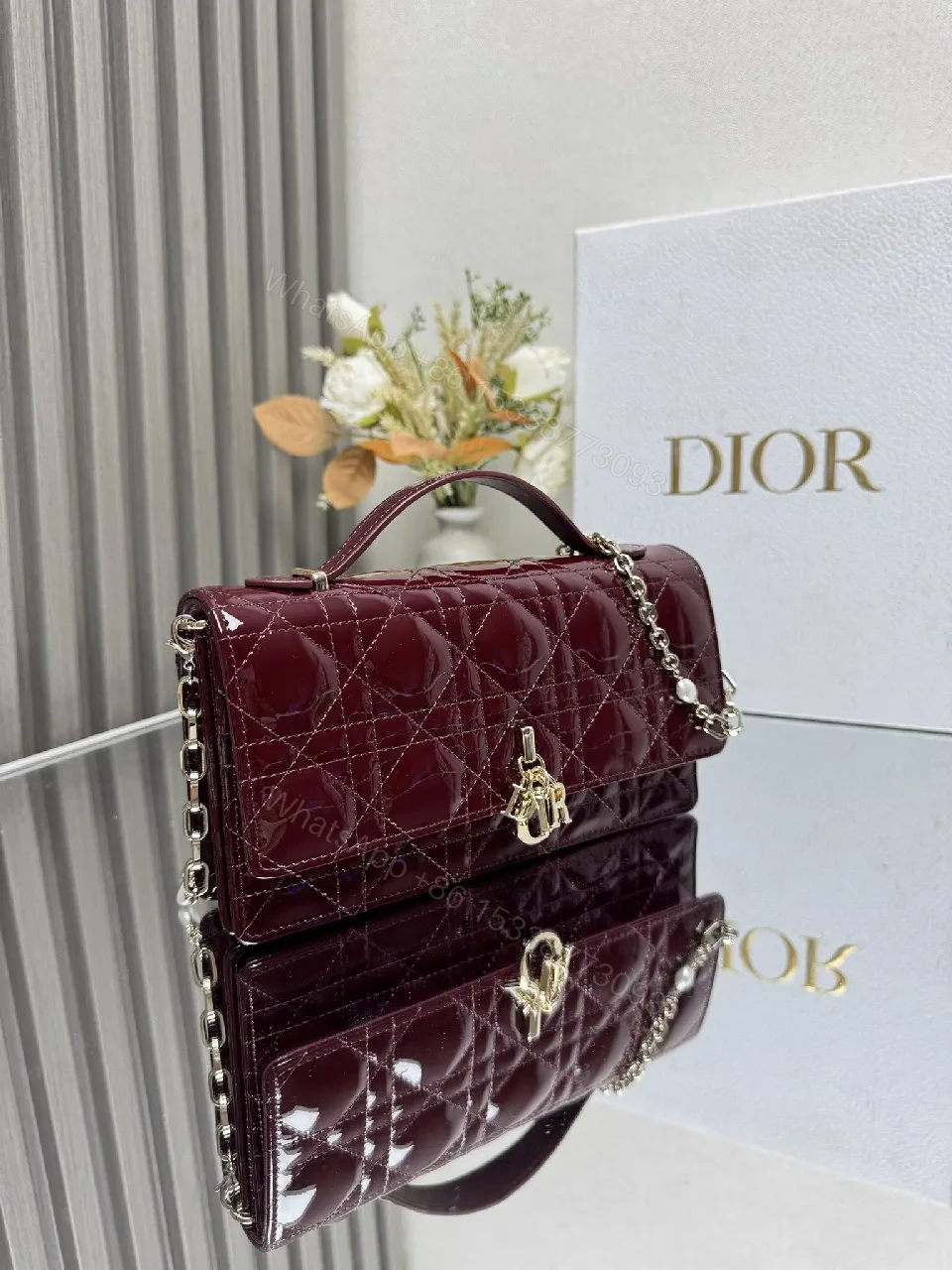 View 7 of Burgundy Patent Leather Clutch: Geometric Quilted Luxury