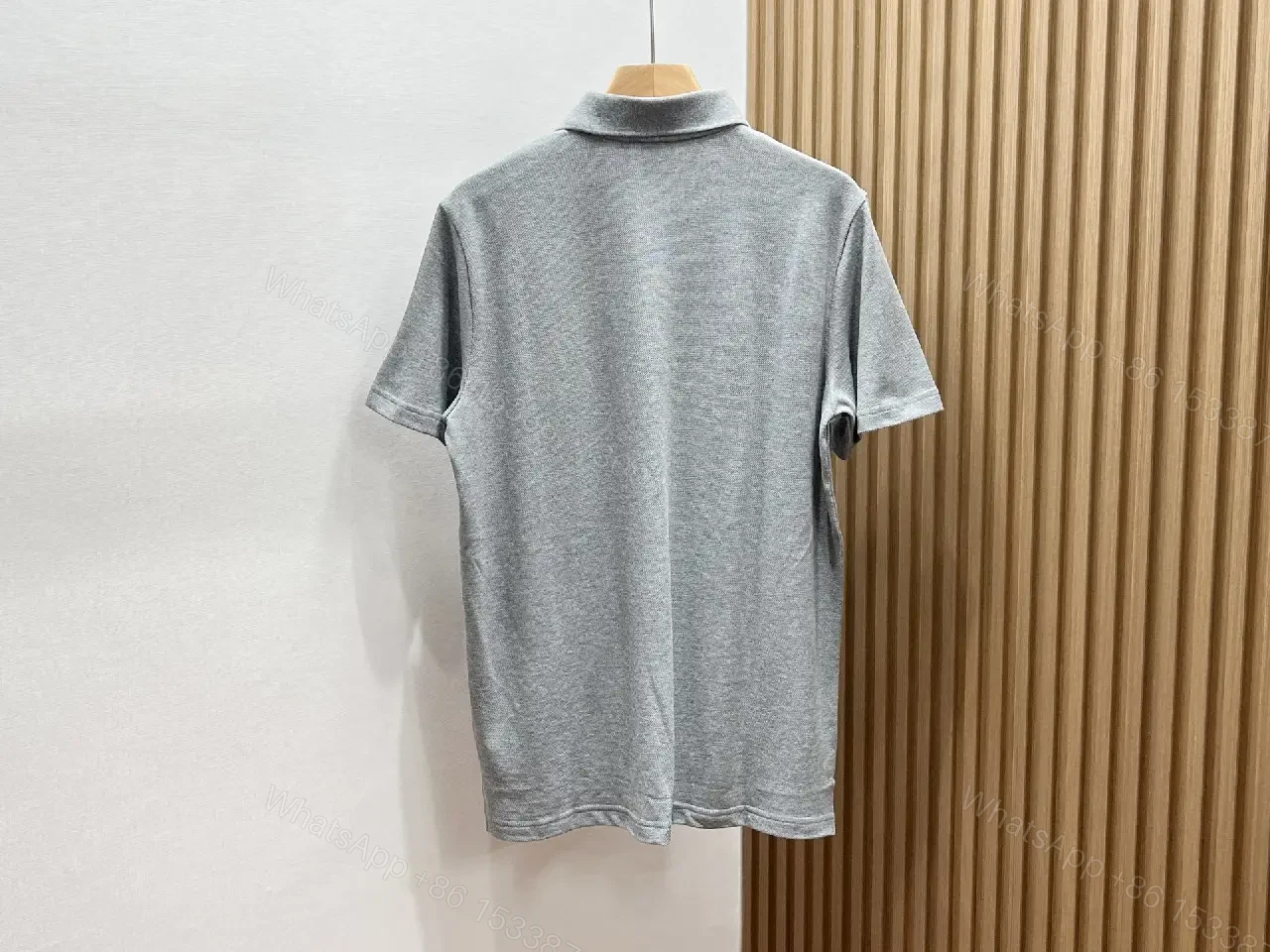 View 9 of Minimalist White Cotton Polo with Subtle Detailing