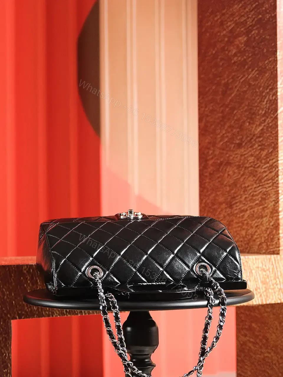 View 2 of Black Quilted Leather Handbag - Classic Chic, Compact Luxury