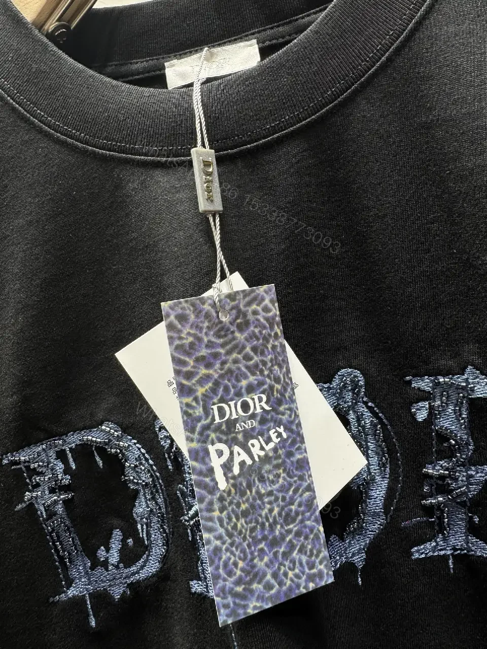 View 6 of Black Cotton Tee – Distressed Logo, Modern Streetwear Top