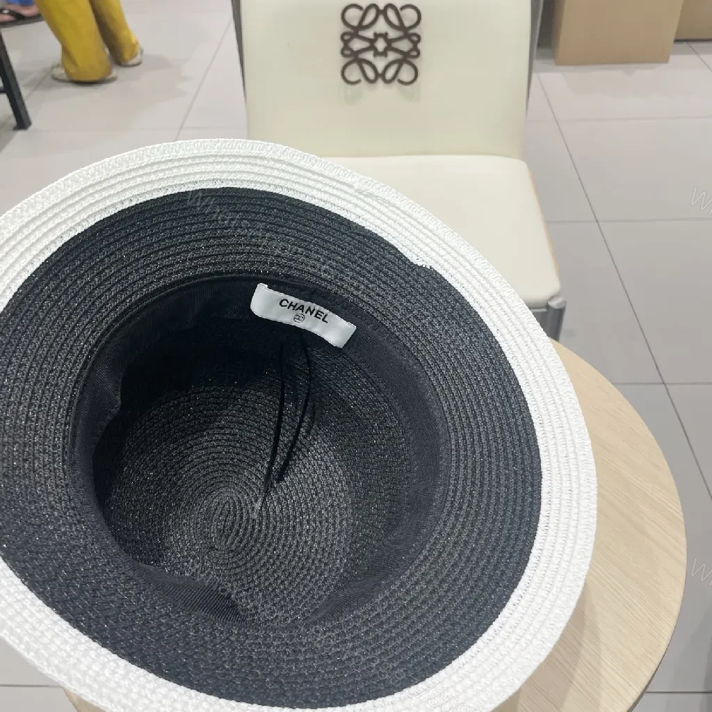 View 3 of Black-White Straw Hat with Ribbon Flower Accent - Sun Ready Couture-style Hat