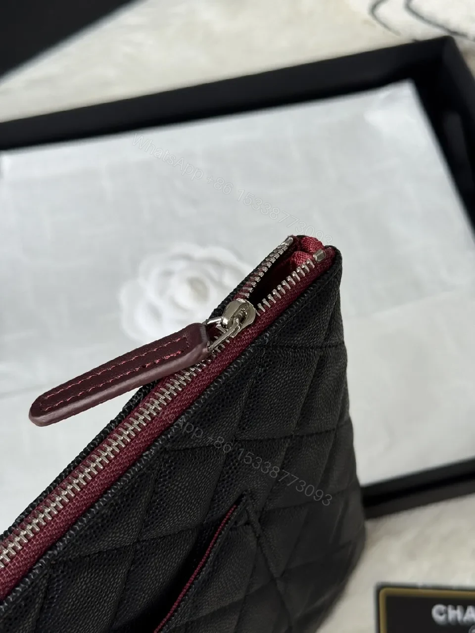 View 2 of Quilted Black Leather Wallet with Red Zip - Minimalist Luxe
