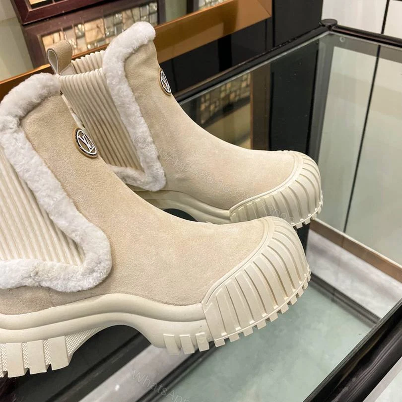 View 5 of LOUIS VUITTON RUBY FLAT BOOTS SUEDE CALFSKIN AND SHEARLING BEIGE 1AGWGB