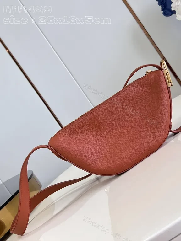View 5 of Leather Belt Bag: Subtle LV Logo, Crescent Shape, Crossbody Carry