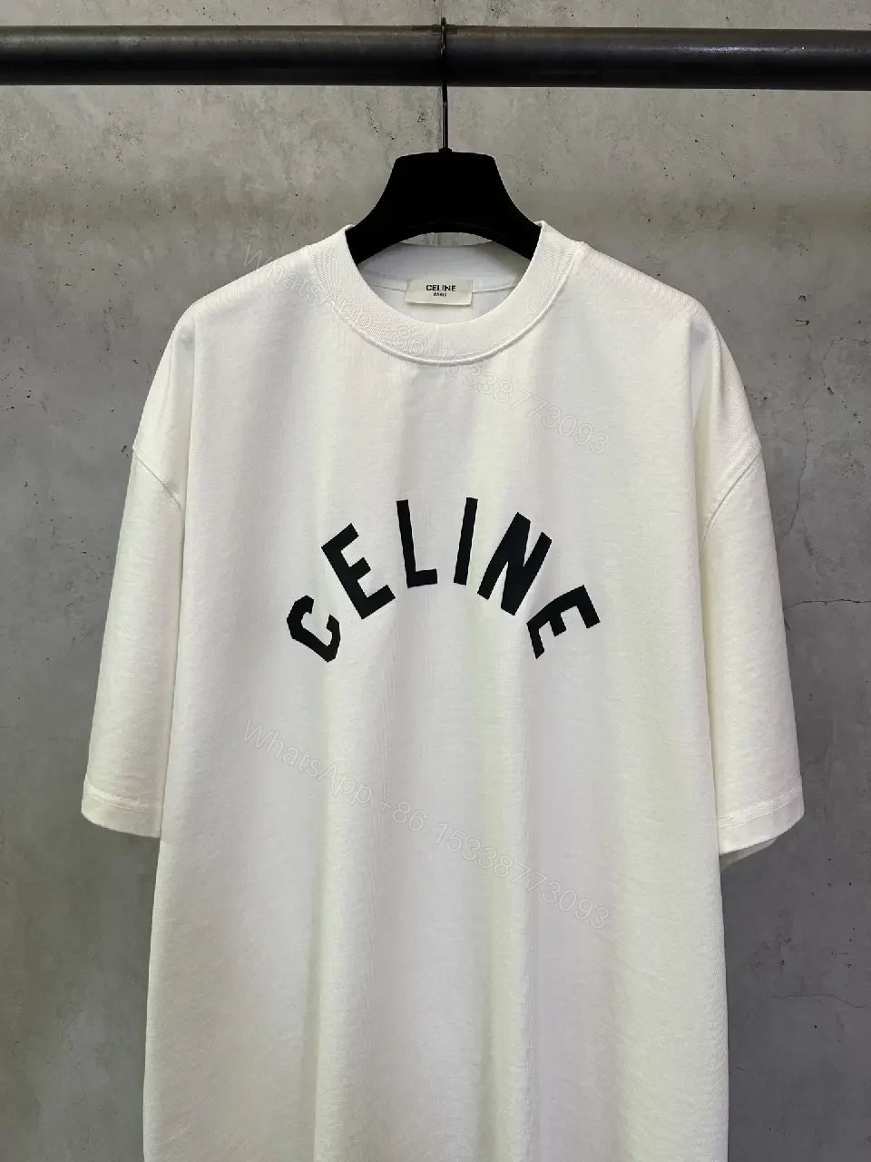 View 6 of Oversized White Cotton Tee with Bold CELINE Arch Graphic