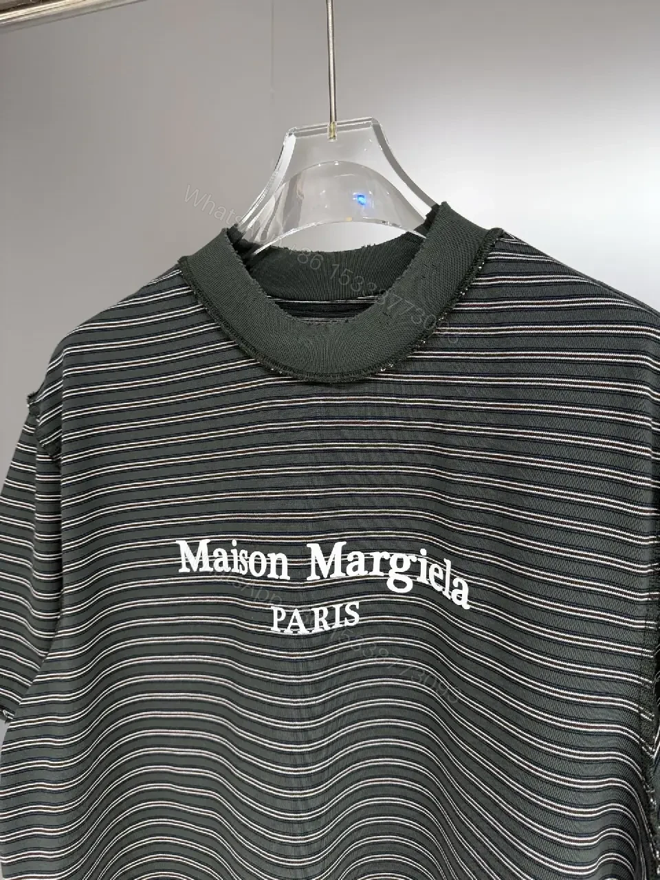 View 5 of Slim Stripe Polo Top - Soft Knit, Logo Accent, Modern Chic