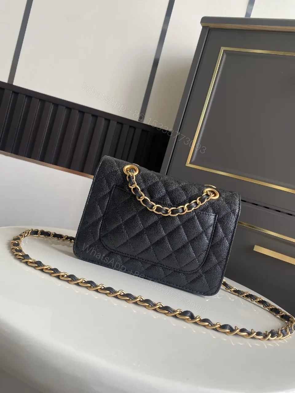 View 6 of Black Quilted Flap Bag with Gold Chain - Timeless Luxe Signature