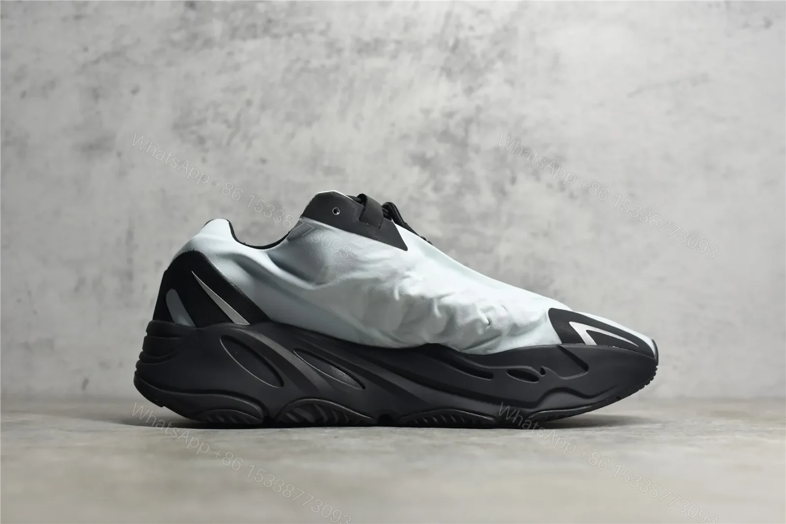View 3 of Adidas Yeezy Boost 700 MNVN Blue Tint Reps
