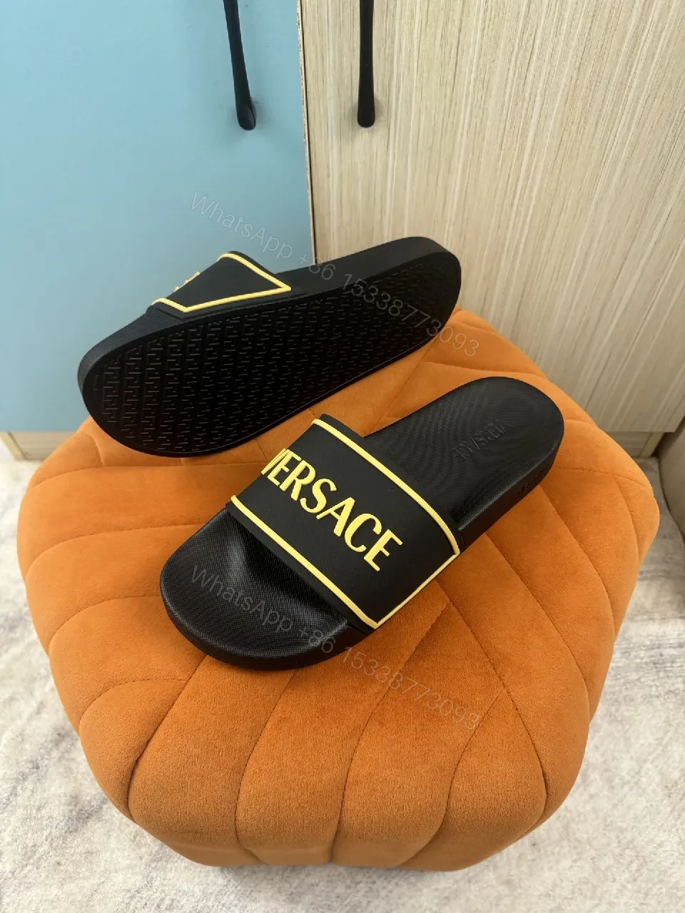 Patterned Comfort Black Slip-Ons: Bold Logo Elevated Style — view 1