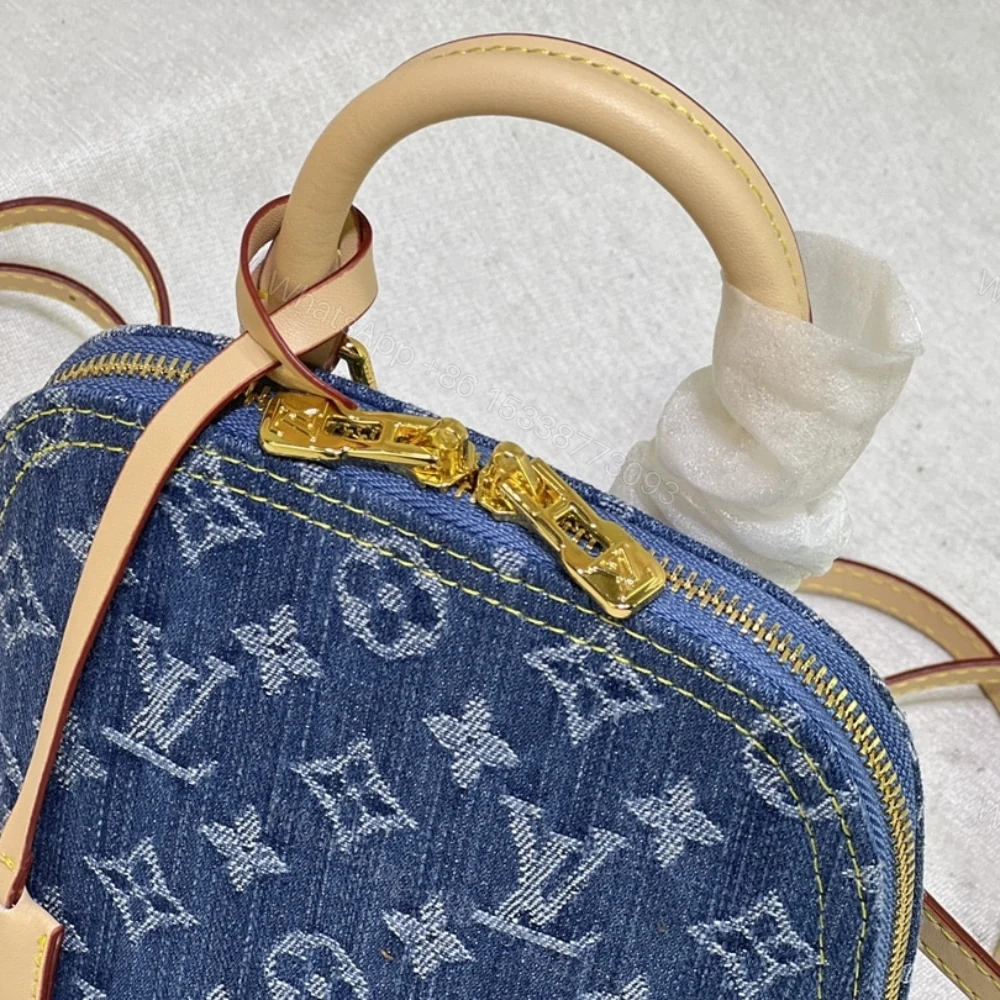 View 8 of Louis Vuitton Alma Backpack Blue Denim 20Cm