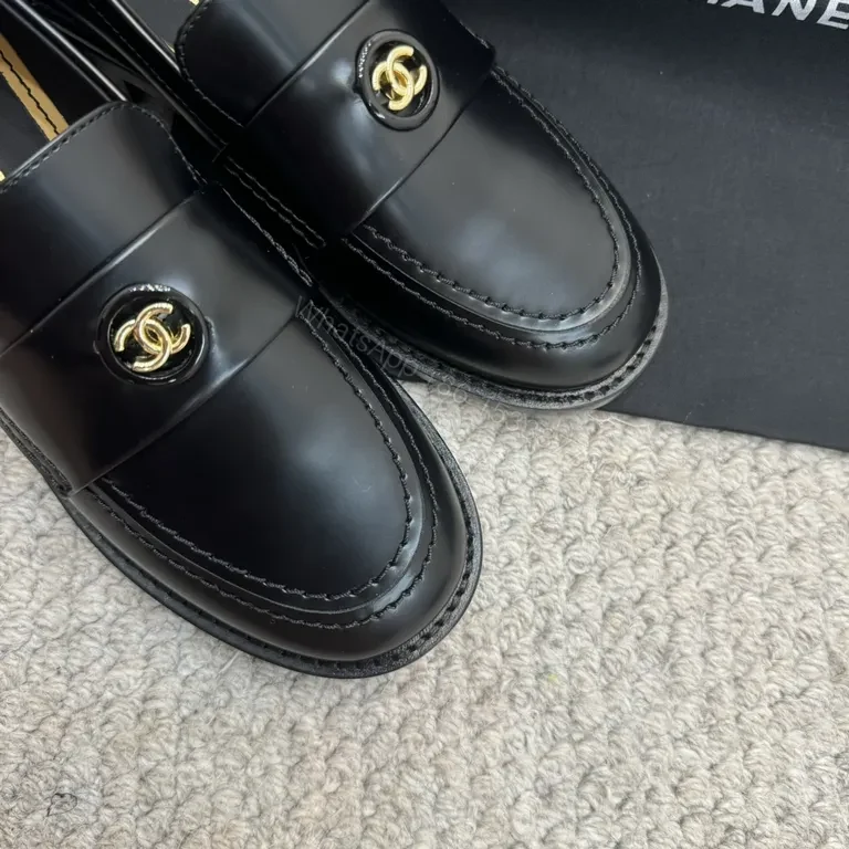 View 6 of Refined Black Leather Loafers with Gold Crest â€“ Luxe Comfort