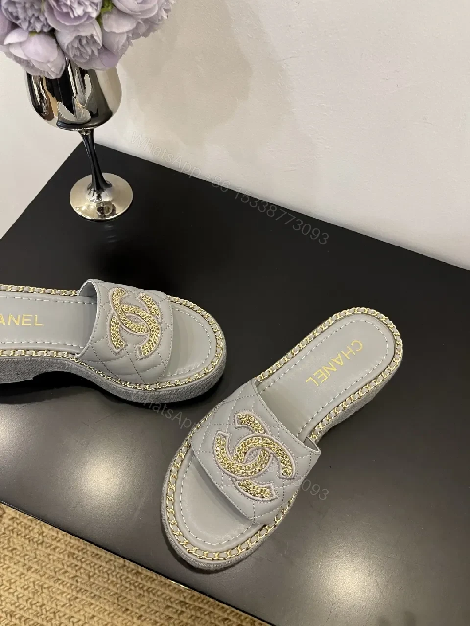 View 3 of Grey Leather Slip-On Sandals with Gold Chain Logo