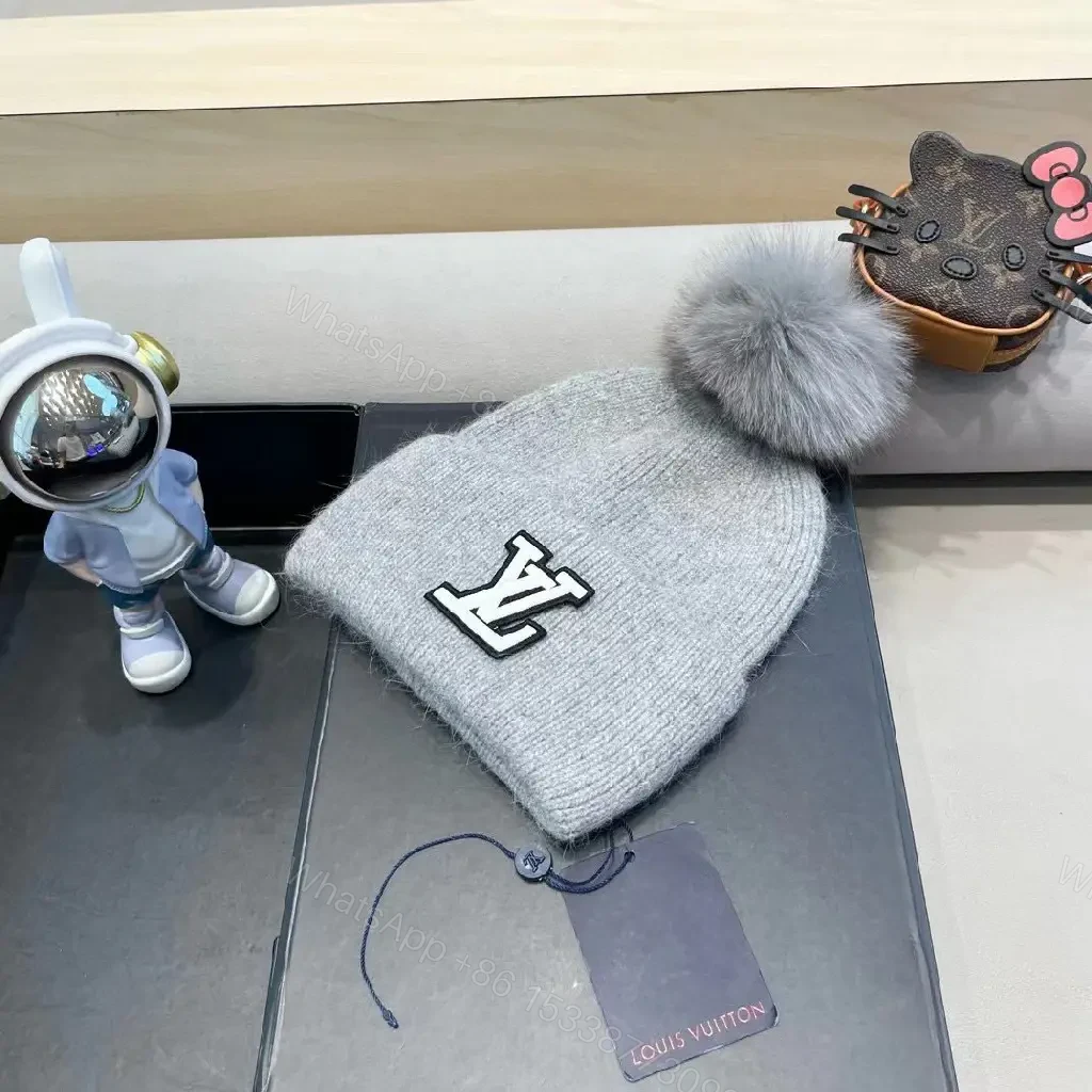 View 2 of Cozy Gray Knit Beanie with LV Emblem Accent