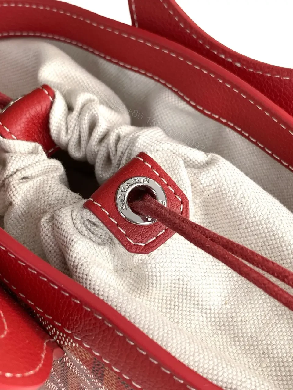 View 3 of Compact Luxury Handbag: Red Leather Trim, Iconic Pattern