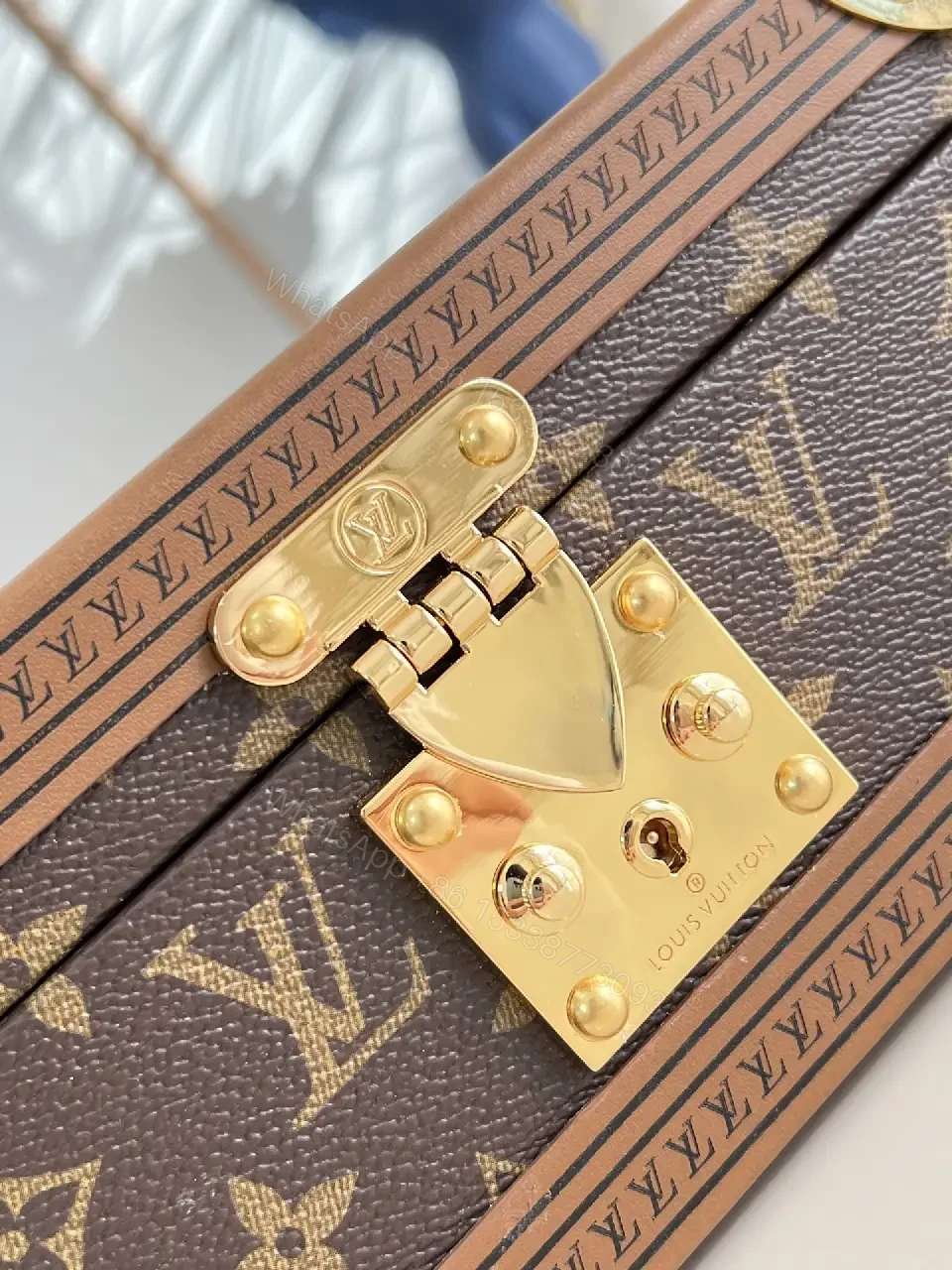 View 2 of Monogram Canvas Clutch with Gold Hardware - Structured Luxe Style