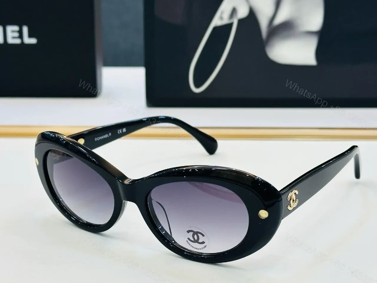View 8 of Chic Black Cat-Eye Sunglasses with Gold Detailing
