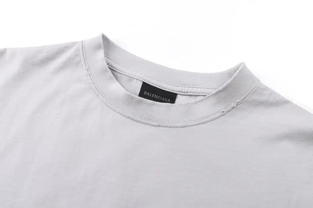 View 4 of Minimal White Cotton Tee: Subtle Logo, All-Day Comfort