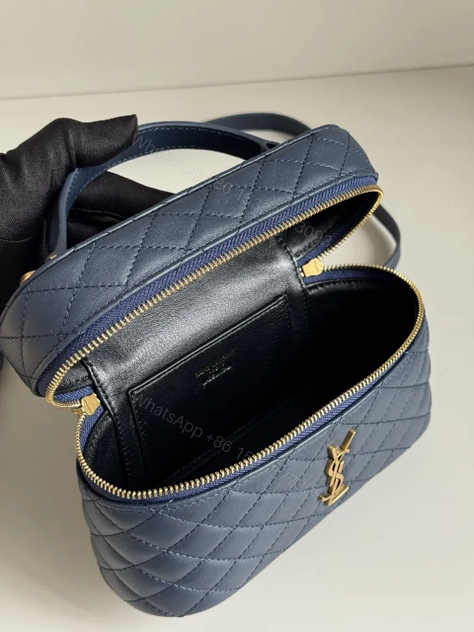 View 5 of Navy Quilted Leather Crossbody Bag with Gold Hardware