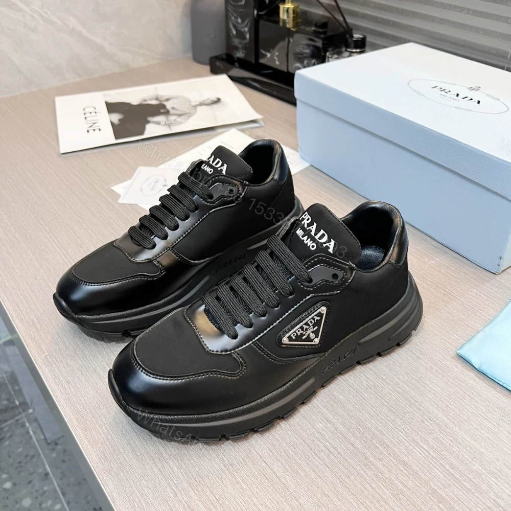 View 3 of Prada Prax 01 Re Nylon And Brushed Leather Sneaker Black 2EE369 3LF5 F0632 F G000