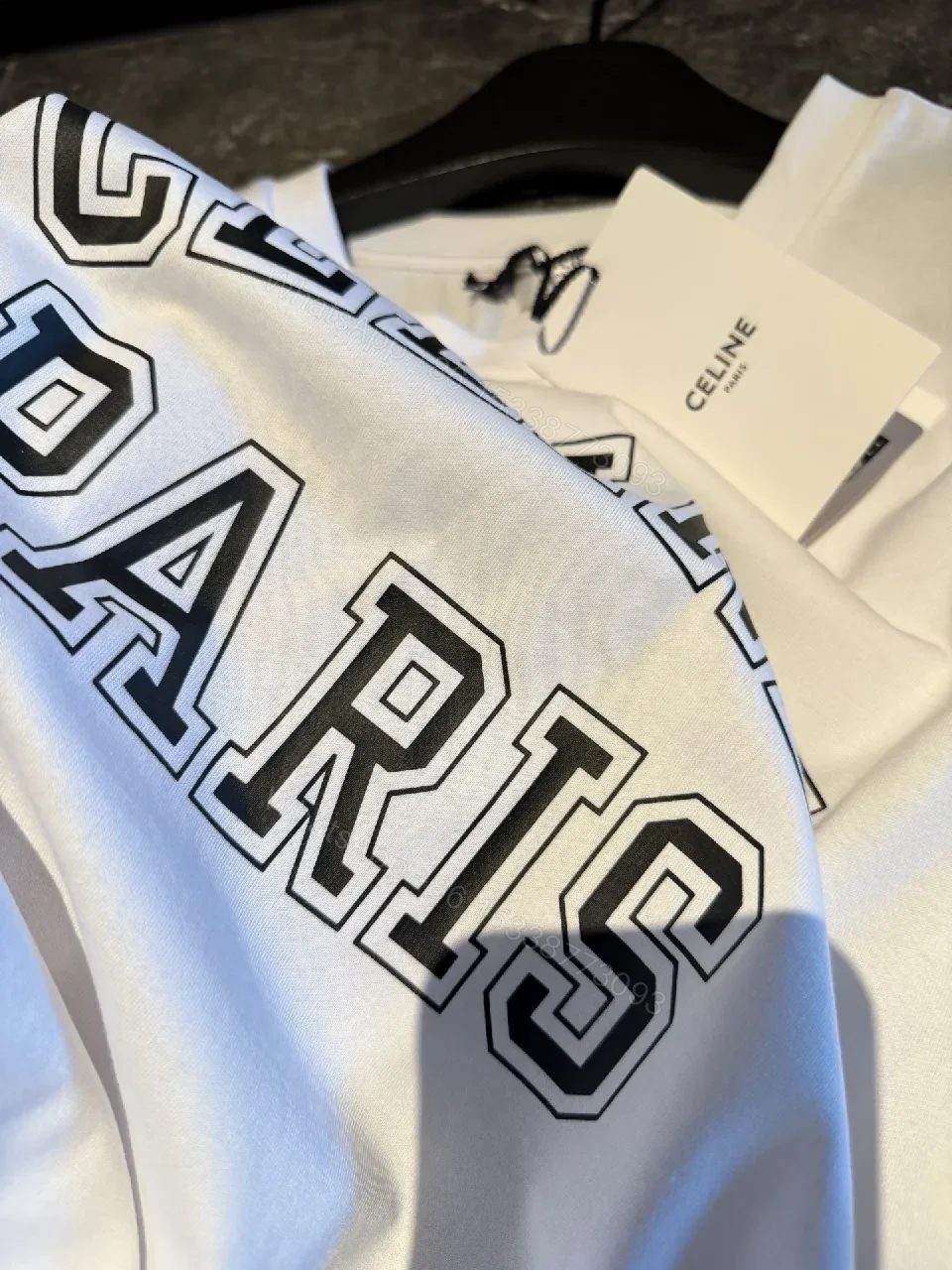 View 3 of White Cotton Modern Tee: Bold Logo, Premium Comfort, Everyday Style