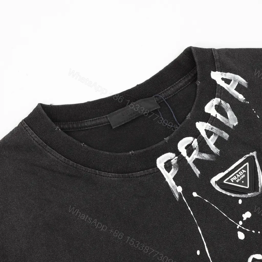 View 2 of Black Cotton Relaxed Crew Tee with White Graphic PRADA Accent