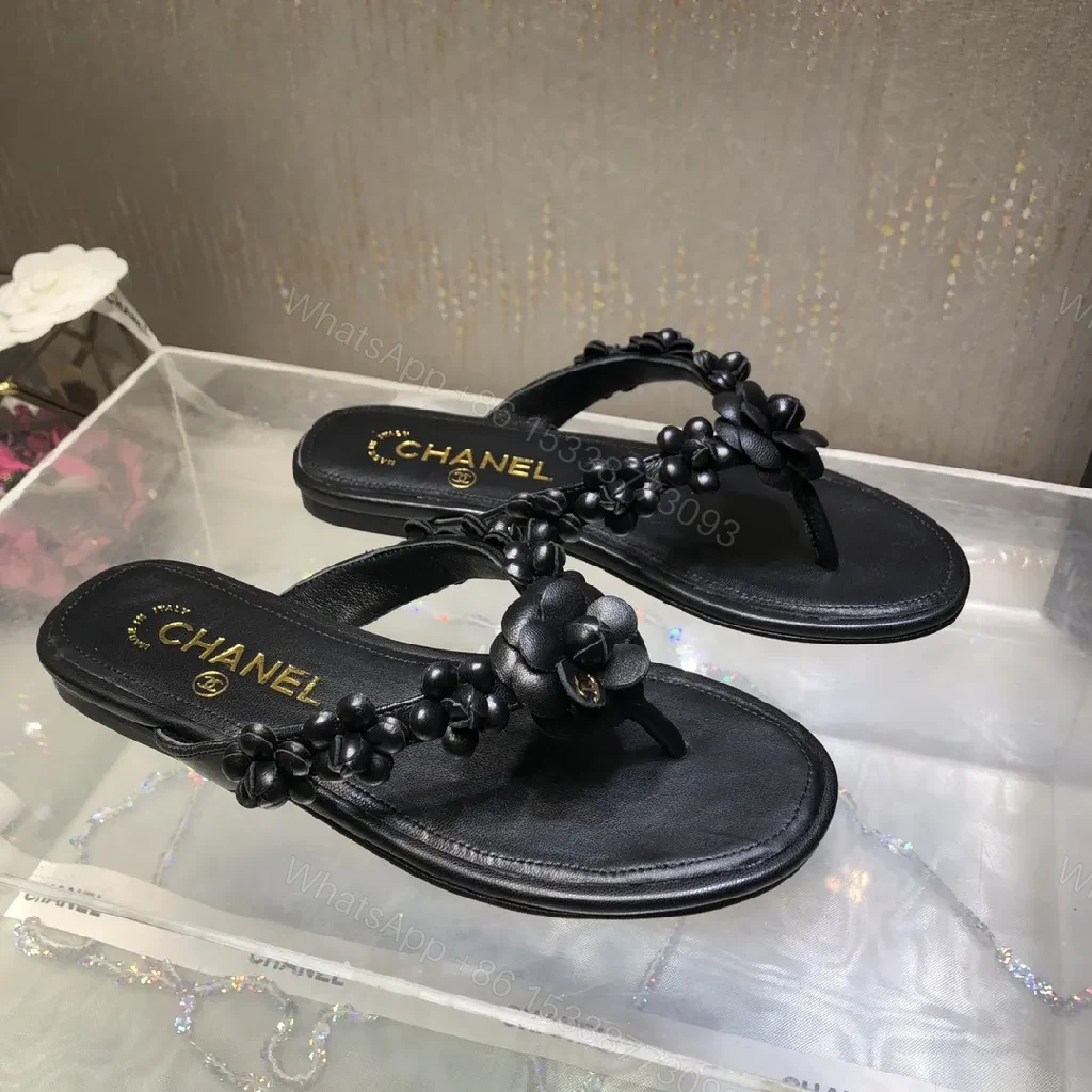 View 3 of Black Leather-Feel Floral Slip-Ons with Luxe Accents