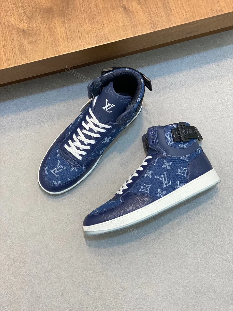 View 2 of Blue Patchwork Leather-Textile High-Top Sneakers with Monogram Feature