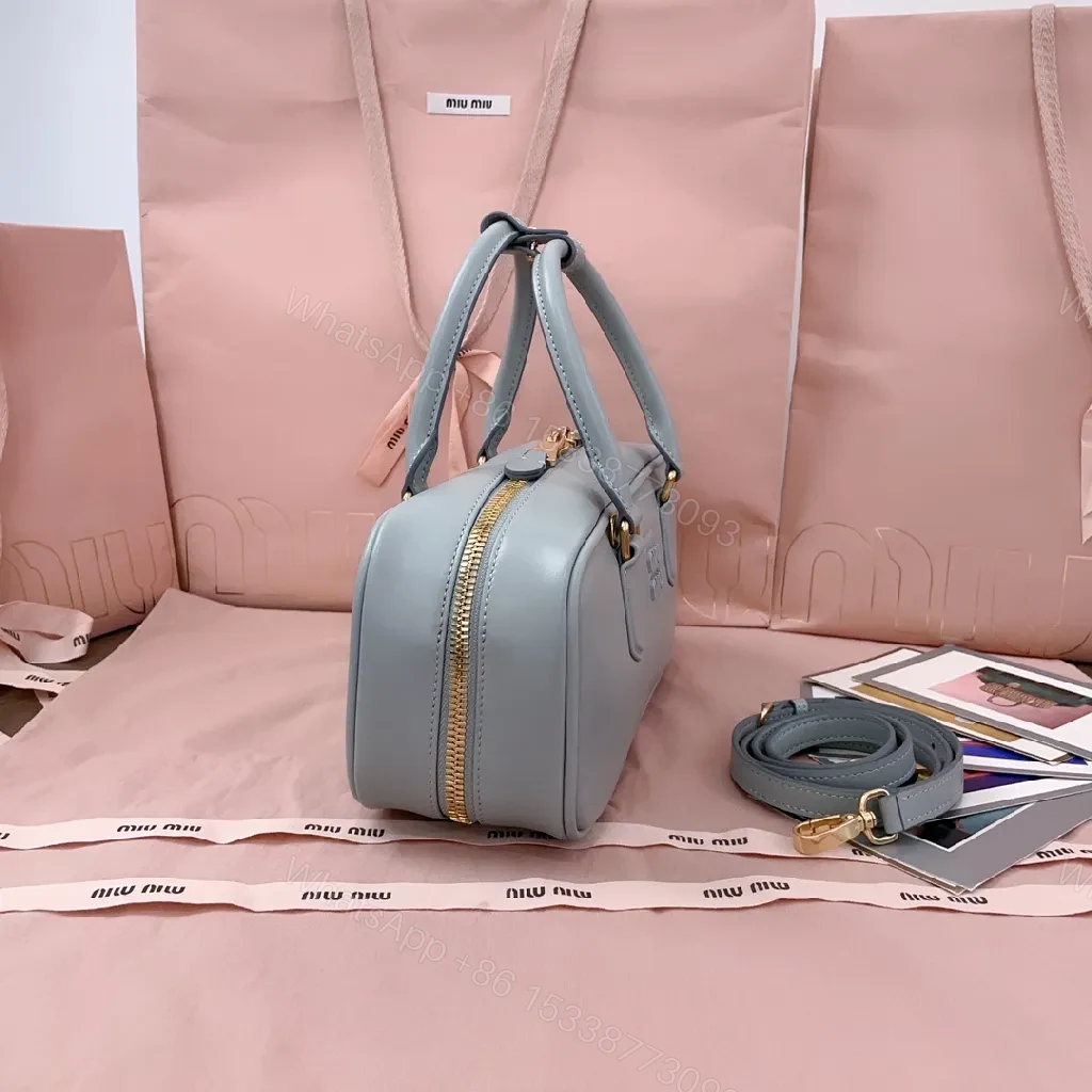 View 8 of Structured Dome Bag: Compact Luxury, Gold Accents, Versatile Style