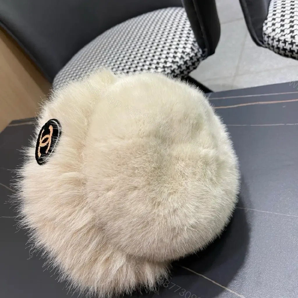 View 2 of Cream Faux Fur Pom Hat: Lux Soft Warmth, Subtle Logo Accent