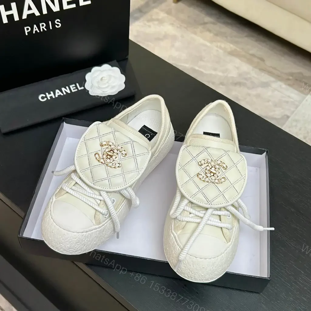 View 6 of Quilted Leather Slip-On Sneakers with Crest Embroidery