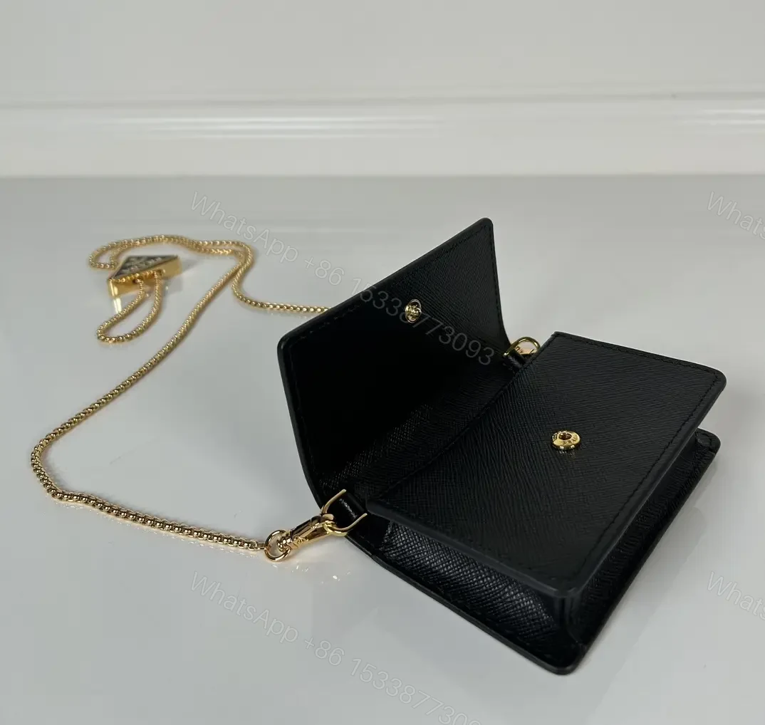 View 4 of Compact Crossbody Bag: Black Leather, Gold Chain, Minimalist Luxe