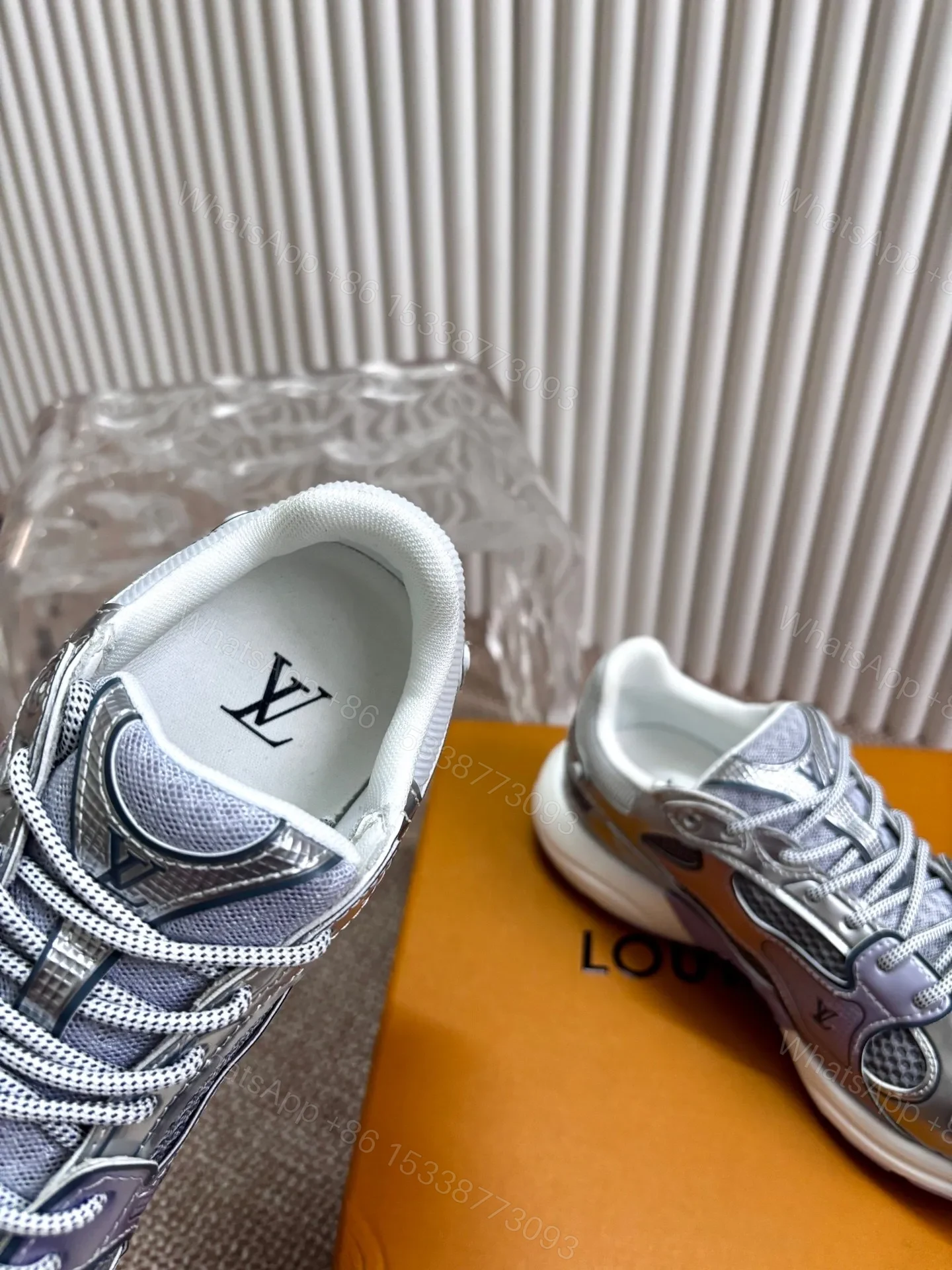 View 2 of LV Women Silver Mesh And Leather Sneakers