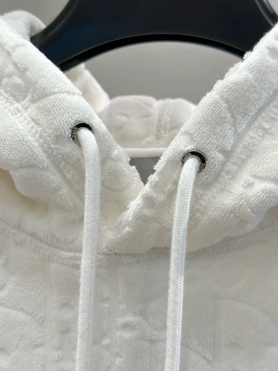 View 5 of Quilted Monogram Hoodie: Luxurious Everyday Comfort