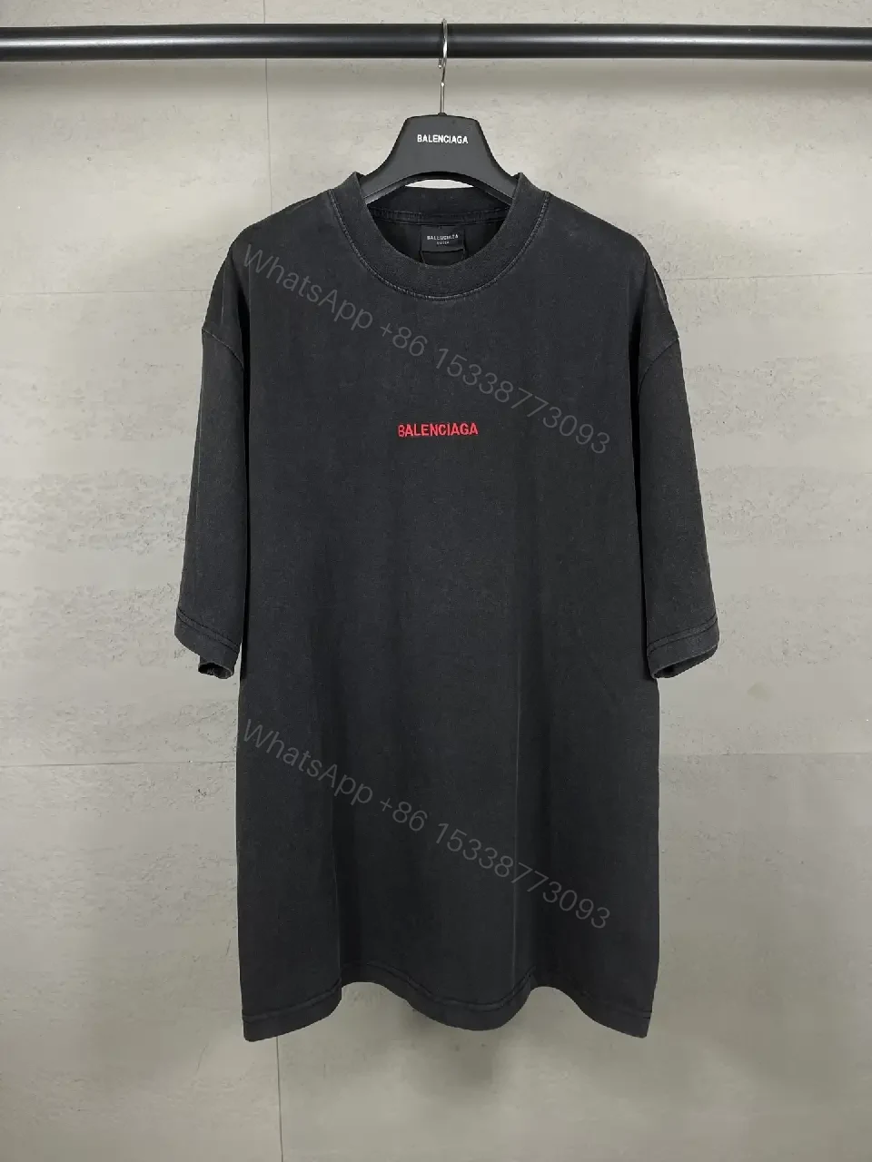 View 8 of Oversized Black Tee Dress with Subtle Red Logo, Modern Couture Edge