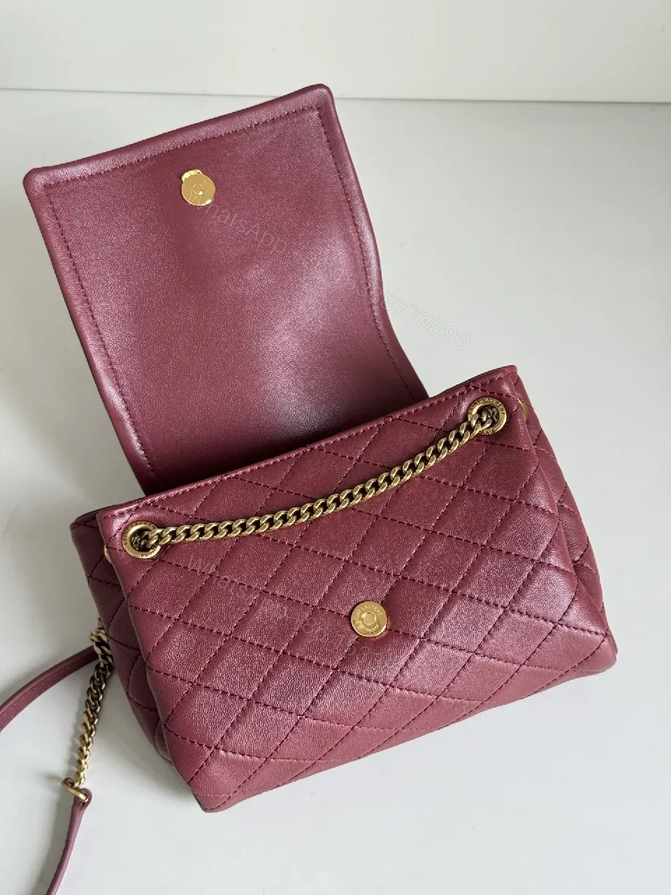 View 3 of Richly Textured Burgundy Leather Bag, Compact, Quilted Crossbody