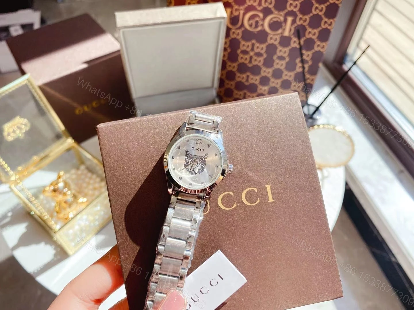 View 3 of Gucci G Timeless 27Mm
