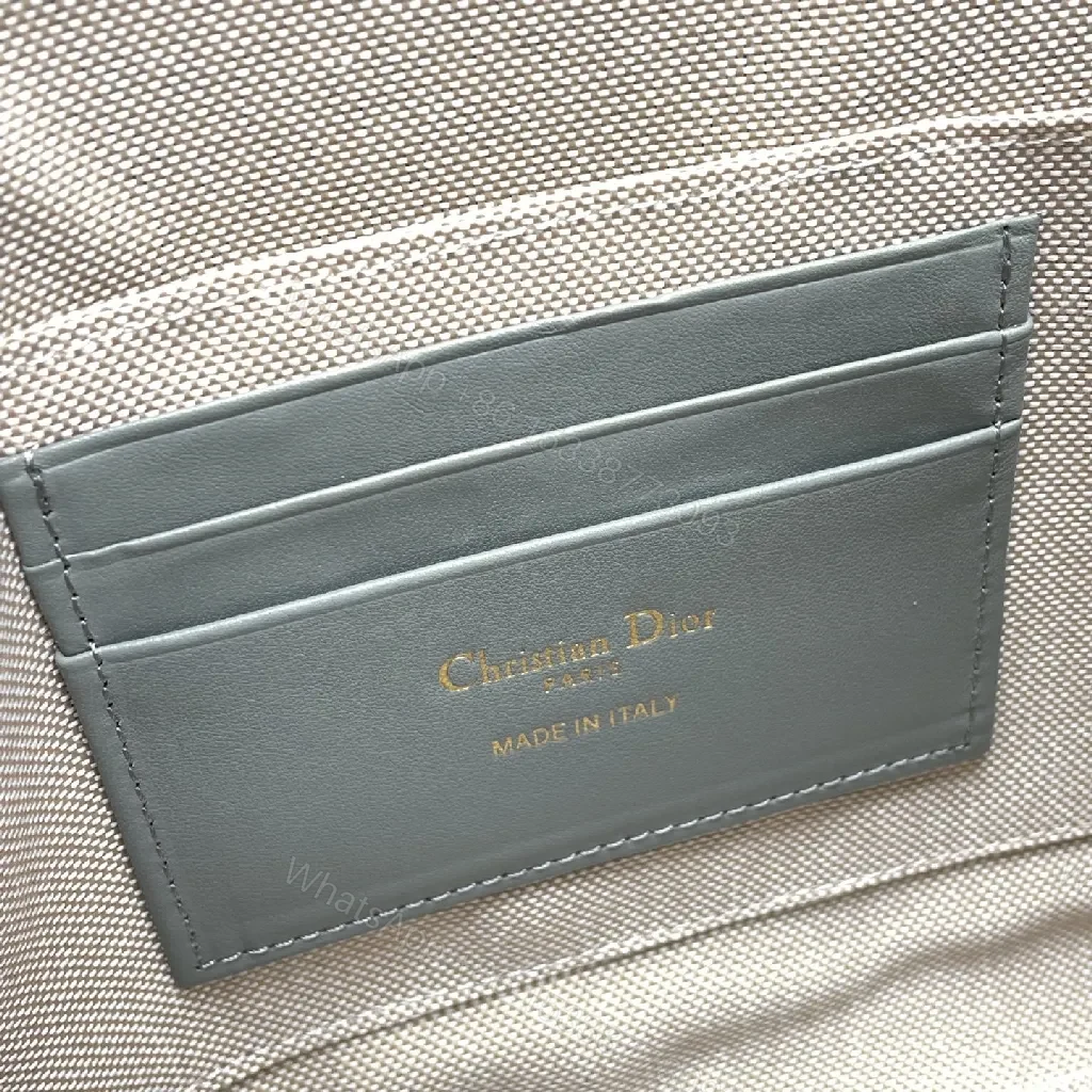 View 4 of Structured Monogram Wallet — Signature Pattern, Gold Hardware, Zippered Clutch